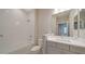 Clean bathroom with a bathtub, toilet, and vanity at 14631 Barefoot Ln, Parrish, FL 34219