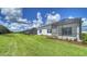 Community of homes with grassy yards and screened porches at 14631 Barefoot Ln, Parrish, FL 34219