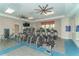 Fitness center with various cardio and strength equipment at 14631 Barefoot Ln, Parrish, FL 34219