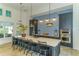 Well-equipped community kitchen with dark cabinetry and quartz countertops at 14631 Barefoot Ln, Parrish, FL 34219