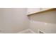 Laundry room with white cabinets and washer/dryer hookups at 14631 Barefoot Ln, Parrish, FL 34219