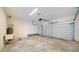 Attached garage with automatic door opener and ample space at 14631 Barefoot Ln, Parrish, FL 34219