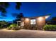 Night view of a modern home with attractive wood siding at 301 Aurora E St, Venice, FL 34285