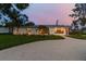 Bright white contemporary home with modern windows at 301 Aurora E St, Venice, FL 34285