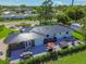 Luxury home with a large backyard, patio, and hot tub at 301 Aurora E St, Venice, FL 34285