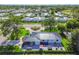 Luxury home with a large backyard, patio, and hot tub at 301 Aurora E St, Venice, FL 34285
