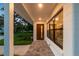 Inviting front porch with modern door and windows at 301 Aurora E St, Venice, FL 34285