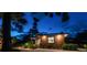 Modern home exterior with wood siding and landscaping at 301 Aurora E St, Venice, FL 34285