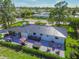 Luxury home with a large backyard, patio, and hot tub at 301 Aurora E St, Venice, FL 34285