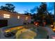 Inviting hot tub area with fire pit and seating at 301 Aurora E St, Venice, FL 34285