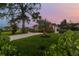 Attractive curb appeal with landscaped lawn and modern home at 301 Aurora E St, Venice, FL 34285