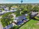 Luxury home with a large backyard, patio, and hot tub at 301 Aurora E St, Venice, FL 34285