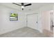 Spacious bedroom with a large closet and sliding doors at 301 Aurora E St, Venice, FL 34285