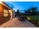 Outdoor patio with seating area and lighting at 301 Aurora E St, Venice, FL 34285