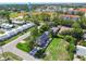 An aerial view of a renovated home in a residential area at 301 Aurora E St, Venice, FL 34285