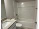 Bathroom with granite vanity, and combined shower and bathtub at 4012 Oscar Ter, North Port, FL 34286