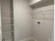 Walk-in pantry featuring multiple shelves for optimal storage and convenience at 4012 Oscar Ter, North Port, FL 34286