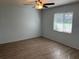 Spacious bedroom with vinyl flooring and ceiling fan at 4540 Tippecanoe Trl # 183, Sarasota, FL 34233
