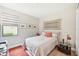 Cozy bedroom with a queen-size bed, nightstands and decorative wall art at 5244 Barnett Cir, Lakewood Ranch, FL 34211