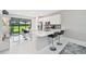 Modern kitchen with white cabinets, stainless steel appliances, and island at 5244 Barnett Cir, Lakewood Ranch, FL 34211
