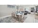 Open concept dining room with view to living area at 5244 Barnett Cir, Lakewood Ranch, FL 34211