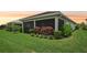 Screened patio and well-manicured lawn at 5244 Barnett Cir, Lakewood Ranch, FL 34211