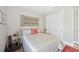 Bright bedroom with a queen bed, nightstands and plenty of closet space at 5244 Barnett Cir, Lakewood Ranch, FL 34211