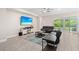 Living room featuring a sectional sofa and sliding glass doors to backyard at 6600 Dovekey Dr, Sarasota, FL 34241
