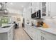 Spacious kitchen with an island and stainless steel appliances at 6600 Dovekey Dr, Sarasota, FL 34241