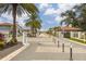 Gated entrance to Heron Landing with security measures at 6600 Dovekey Dr, Sarasota, FL 34241