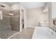 Spa-like bathroom featuring a large shower and a free-standing tub at 6600 Dovekey Dr, Sarasota, FL 34241