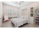 Bedroom with a wall bed, built-in shelving, and toys at 6600 Dovekey Dr, Sarasota, FL 34241