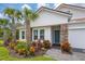 Attractive front yard with landscaping and a welcoming entryway at 6600 Dovekey Dr, Sarasota, FL 34241