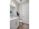 Simple bathroom with toilet, sink, and shower at 6600 Dovekey Dr, Sarasota, FL 34241