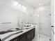 Modern bathroom with marble shower and vanity at 3582 Recurve Cir, Sarasota, FL 34240