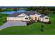 Luxury home on a large lot with a lake view and 3-car garage at 3582 Recurve Cir, Sarasota, FL 34240
