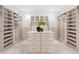 Spacious walk-in closet with ample shelving and drawers at 3582 Recurve Cir, Sarasota, FL 34240