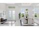 Elegant dining room with marble floors and large windows at 3582 Recurve Cir, Sarasota, FL 34240