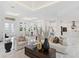 Bright living room with open floor plan and marble floors at 3582 Recurve Cir, Sarasota, FL 34240