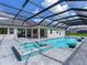 Relaxing pool and spa with covered patio and home view at 3582 Recurve Cir, Sarasota, FL 34240