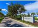 Hampton Lakes community entrance with a welcoming atmosphere and lush landscaping at 3582 Recurve Cir, Sarasota, FL 34240