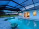 Stunning pool and spa with covered patio, view of sunset at 3582 Recurve Cir, Sarasota, FL 34240