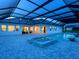 Resort-style pool and spa with covered patio and home view at 3582 Recurve Cir, Sarasota, FL 34240