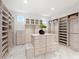 Spacious walk-in closet with ample shelving and drawers at 3582 Recurve Cir, Sarasota, FL 34240