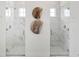 Elegant bathroom with marble shower and double vanity at 3582 Recurve Cir, Sarasota, FL 34240