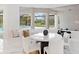 Breakfast nook with built in window seat and marble top table at 3582 Recurve Cir, Sarasota, FL 34240