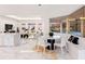 Bright dining area with marble table and built-in window seat at 3582 Recurve Cir, Sarasota, FL 34240