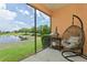 Relaxing screened patio overlooking a pond at 5635 Spanish Point Ct, Palmetto, FL 34221