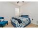 Bedroom with a queen-size bed and blue bedding at 5635 Spanish Point Ct, Palmetto, FL 34221