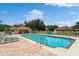 Inviting community pool with lounge chairs at 5635 Spanish Point Ct, Palmetto, FL 34221